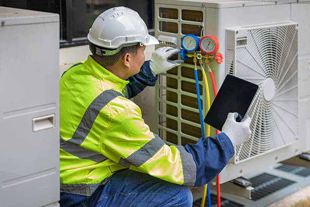 Professional Heat Pump Repair technician working in Hampton, FL